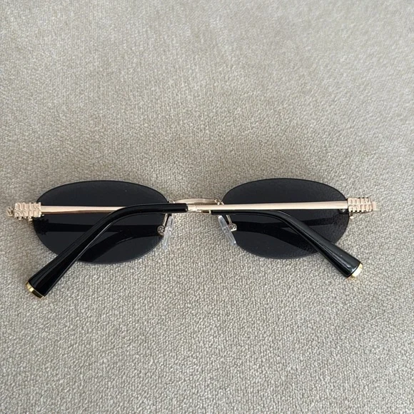 Miu Miu Black Oval Sunglasses - Picture 3 of 6